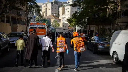 Security personnel at the scene of a car-ramming attack in Jerusalem that wounded two Israelis, April 22, 2024. Photo by Chaim Goldberg/Flash90.