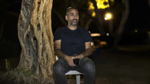 Avihai Brodutch waits for his wife and three kids held by Hamas in Gaza. Photo by Rina Castelnuovo.