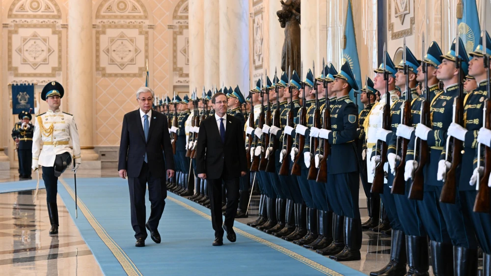 Kazakhstan's president, Kassym-Jomart Tokayev, second from left, walks with his Israeli counterpart Isaac Herzog at the presidential residence in Astana, Kazakhstan on April 27, 2026. Photo by Haim Zach/GPO.