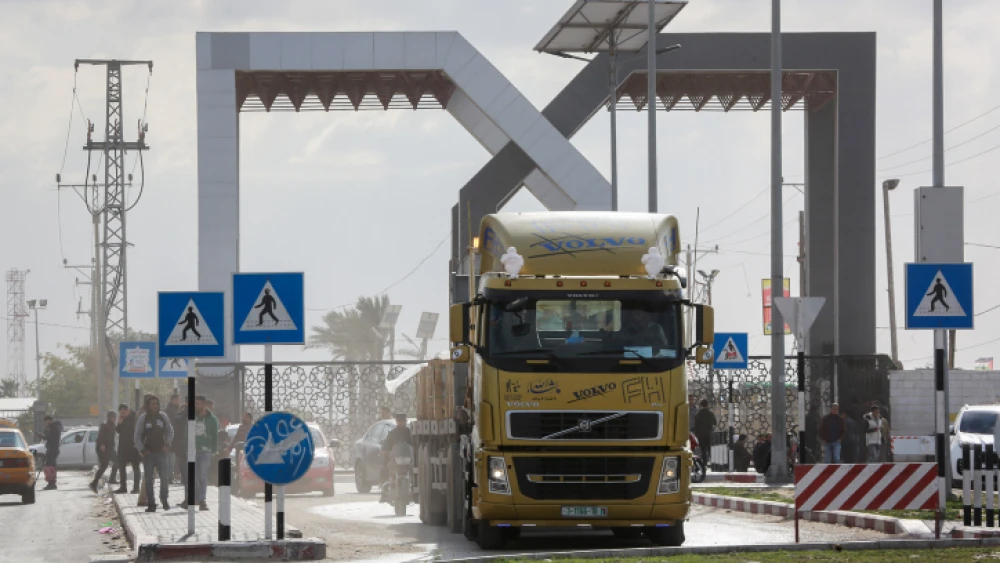 Trucks loaded with goods enter Gaza from the Kerem Shalom crossing in Rafah in the southern Gaza Strip, on Feb. 17, 2019. Photo by Abed Rahim Khatib/Flash90.