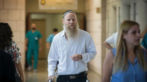 Rabbi Eitan Shnerb at the Hadassah Ein Kerem Hospital in Jerusalem. Rabbi Shnerb was wounded in a terrorist bombing near Dolev that killed his daughter Rina. Aug. 28, 2019. Photo by Yonatan Sindel/Flash90.