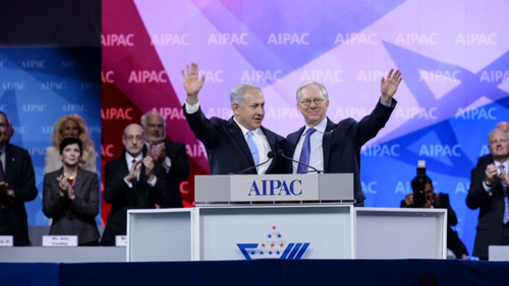 Israeli Prime Minister Benjamin Netanyahu (left) and former AIPAC President Michael Kassen wave to the crowd at the 2014 AIPAC conference in early March in Washington, DC. Netanyahu in his speech at AIPAC called on Palestinian Authority President Mahmoud Abbas to “recognize the Jewish state, and in doing so, you would be telling your people, the Palestinians, that while we might have a territorial dispute, the right of the Jewish people to a state of their own is beyond dispute.” Credit: AIPAC.