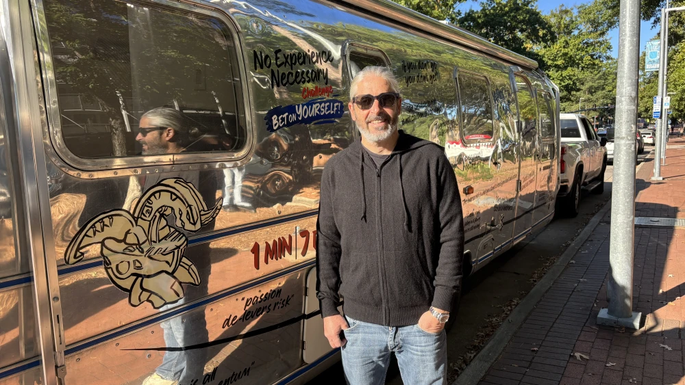 Ronnen Harary stands in front of his Airstream trailer during his “No Experience Necessary” tour. Credit: Courtesy.