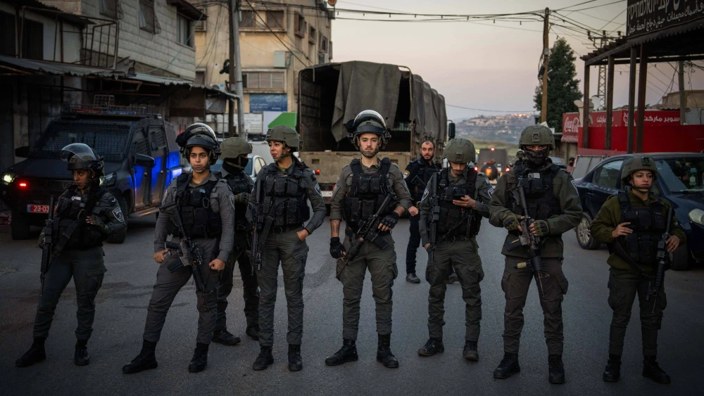 Israeli security forces in the village of al-Funduq, at the scene where three Jews were murdered in a shooting attack, Jan. 6, 2025. Photo by Erik Marmor/Flash90.
