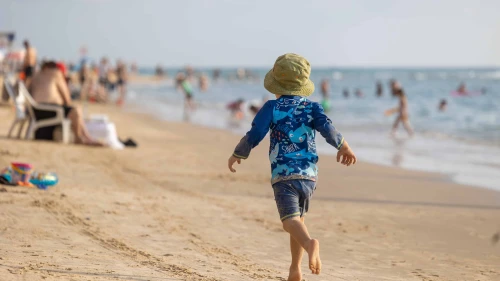 People enjoy the beach in Bat Yam in central Israel, July 25, 2025. Photo by Dor Pazuelo/Flash90.