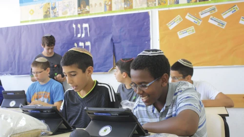 AMIT students learning in the classroom.