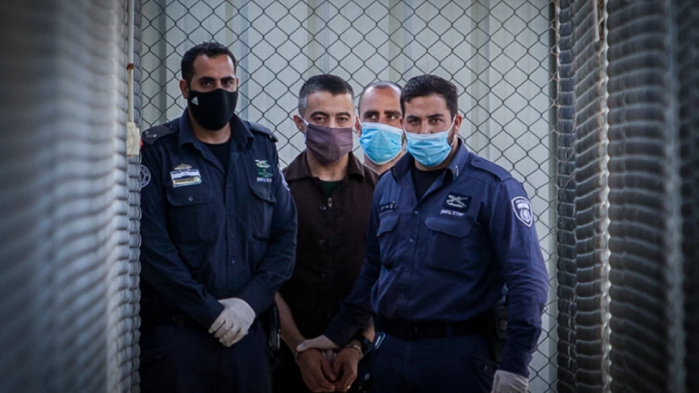 Sahaban Altiti is brought to the courtroom for sentencing at Israel's Ofer military court near Ramallah on July 6, 2020. Altiti committed a terror attack south of Hebron in 2015, killing Avraham Asher Hasno. Photo by Yonatan Sindel/Flash90.