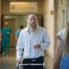 Rabbi Eitan Shnerb at the Hadassah Ein Kerem Hospital in Jerusalem. Rabbi Shnerb was wounded in a terrorist bombing near Dolev that killed his daughter Rina. Aug. 28, 2019. Photo by Yonatan Sindel/Flash90.
