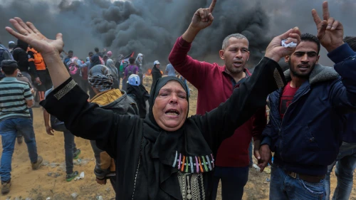 Palestinian protesters during clashes with Israeli forces near the Gaza-Israel border in Rafah, Gaza, on May 14, 2018. Photo by Abed Rahim Khatib/Flash90.