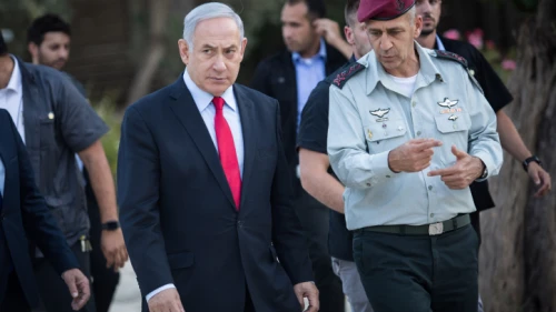 Israeli Prime Minister Benjamin Netanyahu speaks with Israel Defense Forces Chief of Staff Lt. Gen. Aviv Kochavi during an event honoring outstanding IDF reservists at the President's Residence in Jerusalem on July 1, 2019. Photo by Hadas Parush/Flash90.