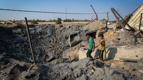 Palestinians inspect the damage after Israeli airstrike overnight in Khan Yunis in the southern Gaza Strip, on June 14, 2019. Photo by Abed Rahim Khatib/Flash90.