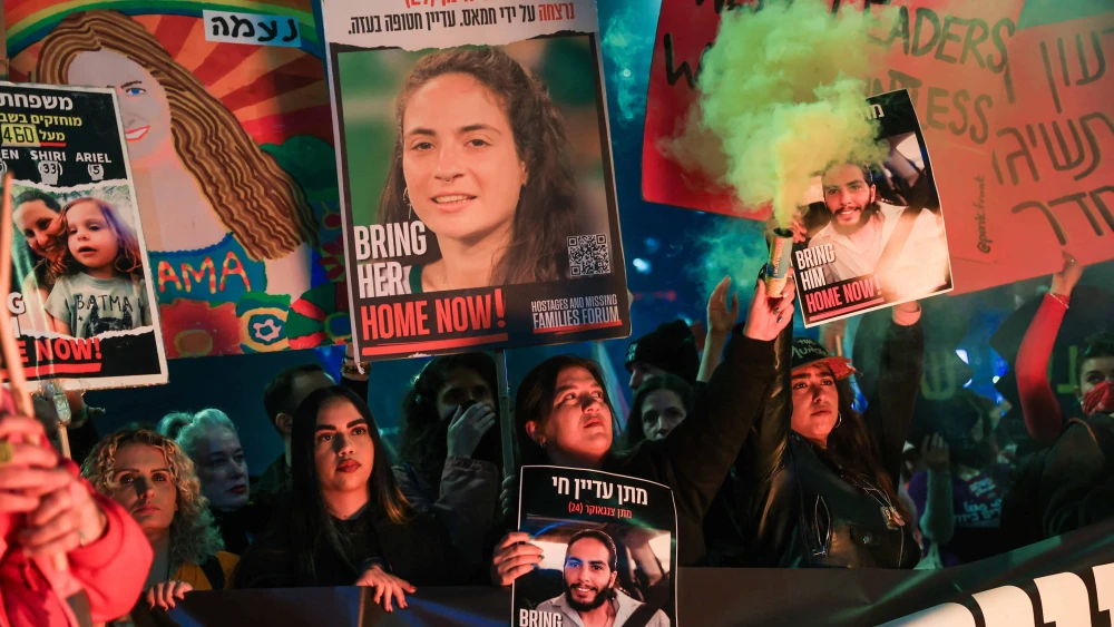 Demonstrators protest against the Israeli government and for the release of Israelis held hostage in the Gaza Strip outside Hakirya Base in Tel Aviv, Jan. 11, 2025. Photo by Itai Ron/Flash90.