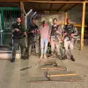 Israeli Border Police officers stand with a 36-year-old suspect from Kalandia arrested for allegedly digging a shaft near the Jerusalem security barrier to infiltrate Israeli territory. Credit: Israel Police.