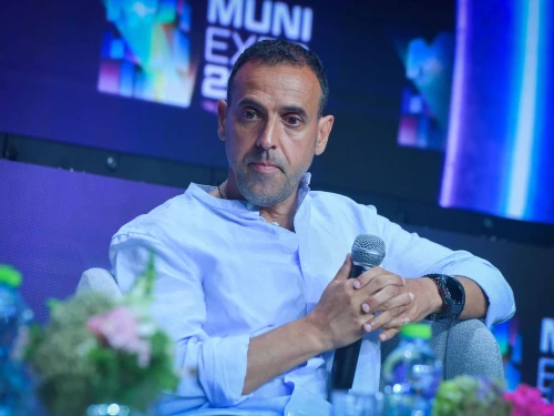 Former hostage Eli Sharabi speaks at the Muni Expo 2025 conference in Tel Aviv, on July 15, 2025. Photo by Avshalom Sassoni/Flash90.