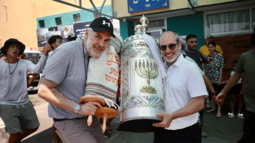 Sefer Torah donor family member Howard Glowinsky and NCSY Canada CEO Rabbi Glenn Black at the Sefer Torah dedication at the Israel Defense Forces’ Naval Academy for Command and Leadership in Akko.
