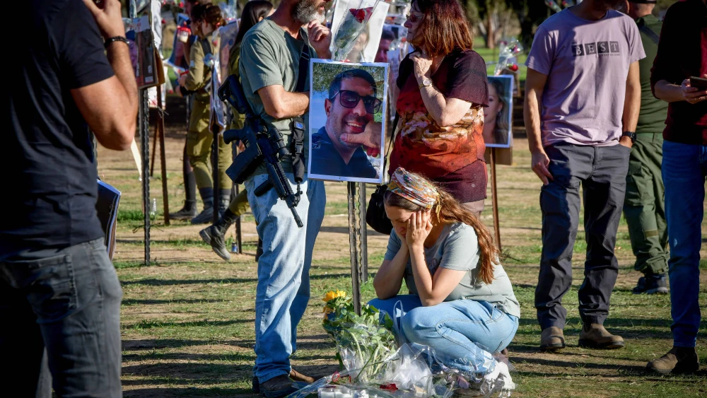 People visit the site of the Supernova music festival massacre near Kibbutz Re'im, Nov. 30, 2023. Photo by Avshalom Sassoni/Flash90.