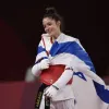 Avishag Semberg, 19, celebrates her bronze medal win at the Tokyo Summer Olympics, July 24, 2021. Photo by Amit Shissel/Israeli Olympic Committee.