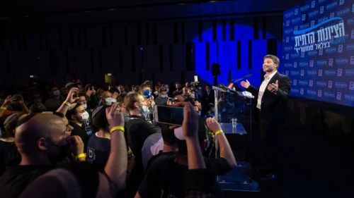 Head of the Religious Zionist Party Bezalel Smotrich and activists celebrate at party headquarters in Modi’in on election night, March 23, 2021. Photo by Sraya Diamant/Flash90.