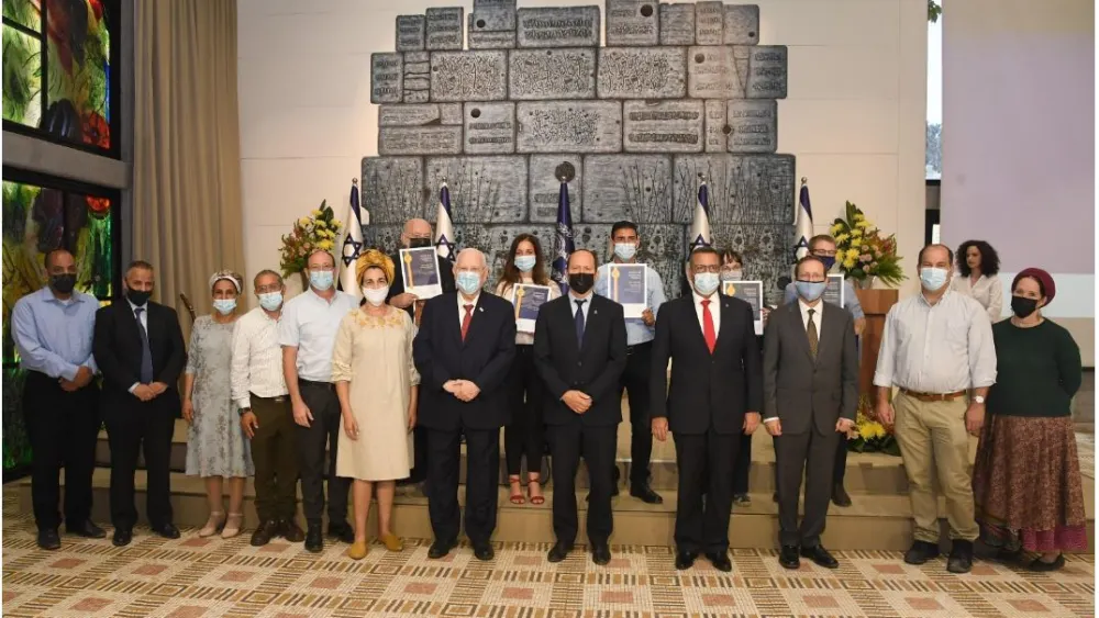 Israeli President Reuven Rivlin (center) with the winners of this year's Jerusalem Unity Prize at the President's Residence, May 3, 2021. Credit: Haim Zach/GPO.