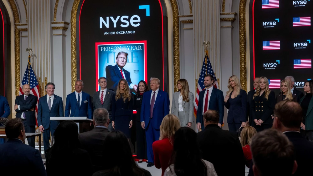 President-elect Donald Trump is joined by members of his family and cabinet as he speaks at a reception at the New York Stock Exchange (NYSE) where he was invited after becoming TIME’s “Person of the Year” for the second time on Dec. 12, 2024 in New York City. Photo by Spencer Platt/Getty Images.