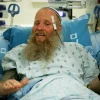 Rabbi Eitan Shnerb speaks to reporters at Hadassah Medical Center in Jerusalem's Ein Kerem, a day after being wounded in a terrorist bombing that killed his 17-year-old daughter Rina and wounded his 19-year-old son Dvir, Aug. 24, 2019. Credit: Flash90.