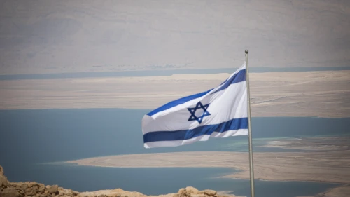 An Israeli flag on Masada, near the Dead Sea in southern Israel, on July 19, 2018. Photo by Yonatan Sindel/Flash90.