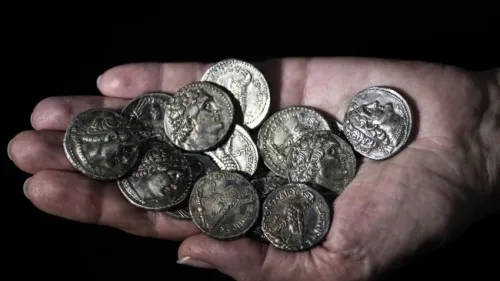 A 2,200-year-old cache of silver coins found in the Judean Desert. Photo by Shai Halevi/Israel Antiquities Authority.