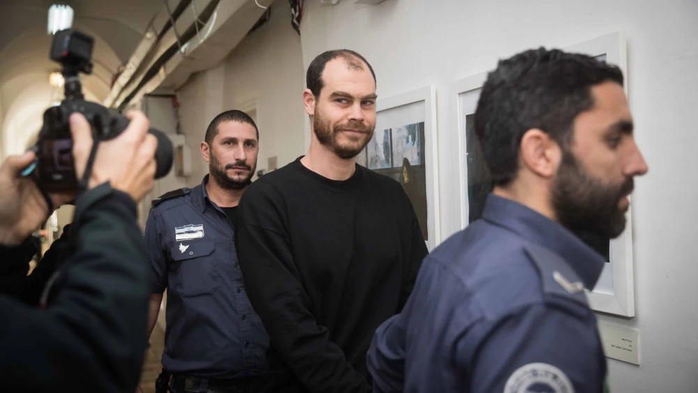 Jonathan Pollak, founder of Anarchists Against the Wall, is seen in the Jerusalem Magistrate's Court, arrested during a protest, Jan. 15, 2020. Photo by Yonatan Sindel/Flash90.
