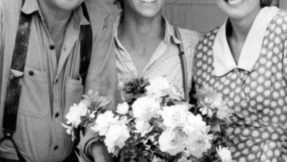 Click photo to download. Caption: John, John-Boy, and Olivia Walton of "The Waltons." Credit: CBS Television via Wikimedia Commons.