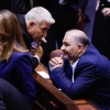 Israeli Foreign Minister Yair Lapid (center) speaks with Mansour Abbas, the head of the Ra'am Party, in the Knesset assembly hall, June 21, 2021. Photo by Olivier Fitoussi/Flash90.