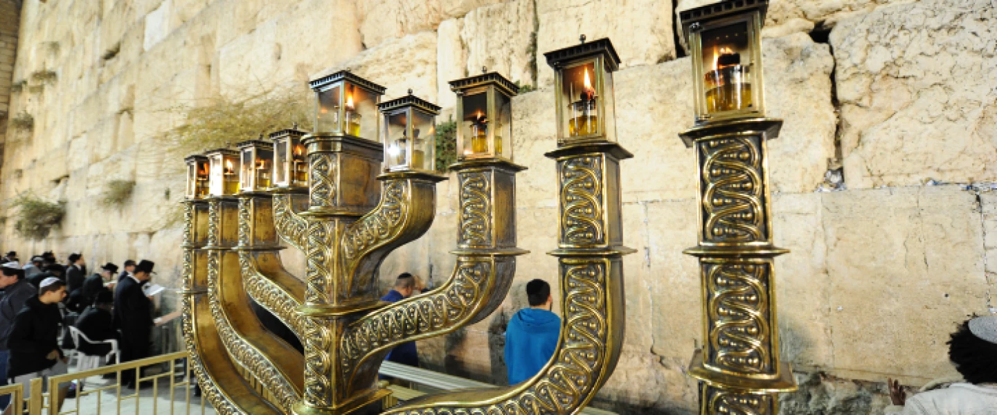 A Hanukkah menorah on the last night of the eight-day Jewish holiday, at the Western Wall in the Old City of Jerusalem, on Dec. 19, 2017. Photo by Mendy Hechtman/Flash90.