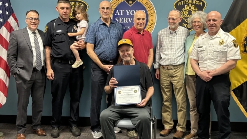 Daniel Mead with U.S. Attorney Rivetti, Officer Smidga, Tree of Life survivors, and PBP Chief Lando. May 20, 2026. Credit: U.S. Attorney's Office, Western District of Pennsylvania