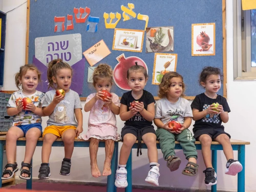 Children learn about the customs of Rosh Hashanah ahead of the Jewish New Year at a kindergarten in Moshav Yashresh in central Israel, Oct. 1, 2024. Photo by Yossi Aloni/Flash90.
