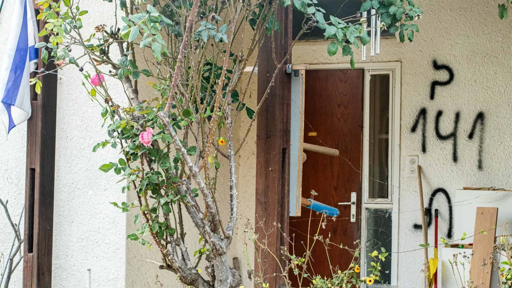 Natural beauty outside a destroyed home in Kibbutz Nirim in southern Israel. Credit: Courtesy.