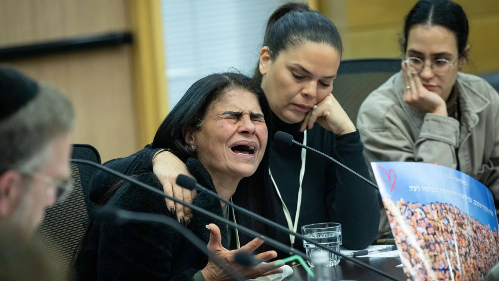 A mother whose son was murdered at the Supernova music festival react during a special committee for public inquiries at the Knesset in Jerusalem on Feb. 14, 2024. Photo by Yonatan Sindel/Flash90.