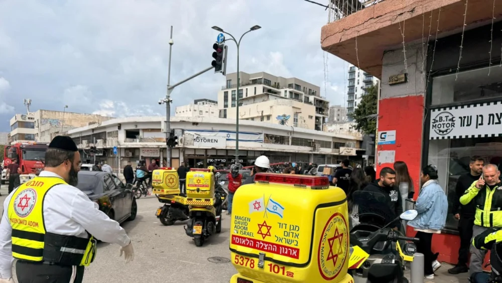 Magen David Adom emergency teams respond to the scene of a missile fragment impact in Tel Aviv on March 26, 2026. Credit: Courtesy of Magen David Adom.