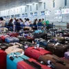 Travellers at Ben Gurion International Airport where flights were being delayed, as the workers of the airport went on strike, in a protest for the release of Israelis held hostage by Hamas terrorists in Gaza, on Sept. 2, 2024. Photo by Avshalom Sassoni/Flash90.