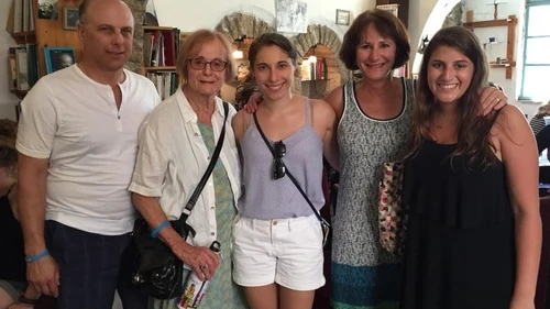 Click photo to download. Caption: In Israel, Eliana Rudee (center) is pictured with her father (far left), grandmother, mother, and a friend who also made aliyah. Credit: Christa Lilly.