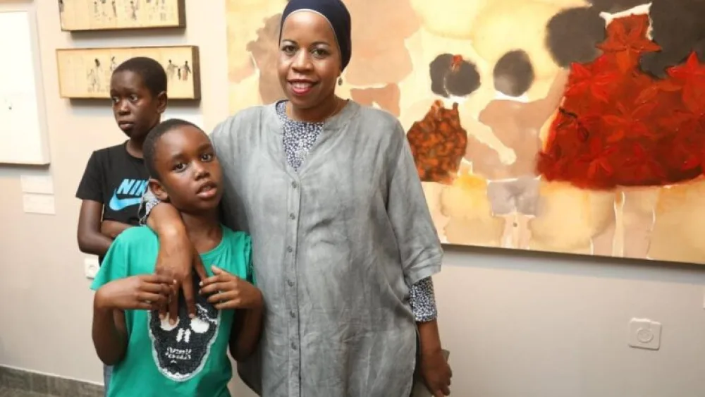 Grabia with her two children. She serves as a role model to young people in her community. Photo courtesy of Zenab Grabia