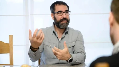 In 2016, Karim Hassoun (pictured) honored a slain Hezbollah terrorist outside the Museum and Documentation Centre on Holocaust and Human Rights in Mechelen, the site of the transit camp from where Jews and Romani in Belgium were sent to Auschwitz. Credit: European Jewish Press.