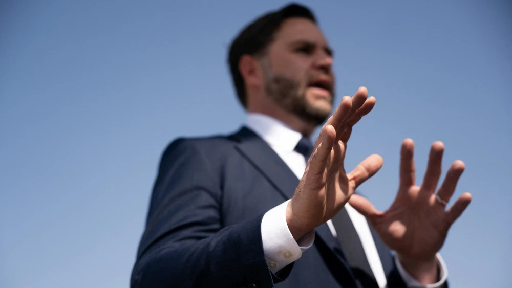 U.S. Vice President JD Vance speaks to members of the media before boarding Air Force Two at Ben-Gurion International Airport on his way back to Washington, D.C., Oct. 23, 2025. Photo by Nathan Howard/POOL/AFP via Getty Images.