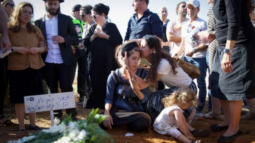 Tal Tamari attends the funeral of her husband, Meir, in Shaked, Samaria, May 31, 2023. Photo by Shir Torem/Flash90.