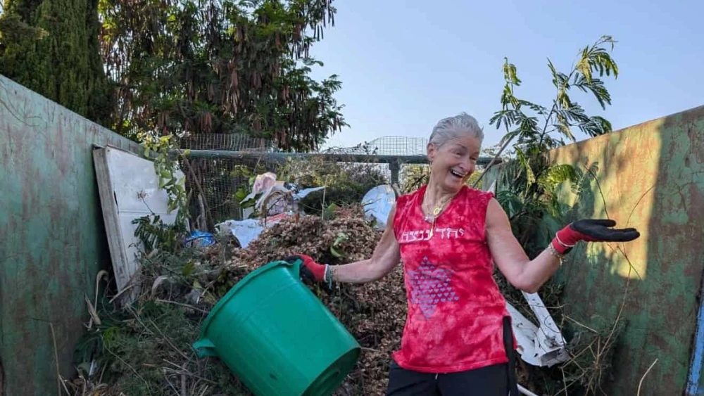 Volunteer Abbe Ellam assists with cleaning up a kibbutz in the south, October 2024. Credit: Abbe Ellam.