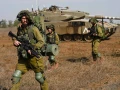 Israel Defense Forces reserve infantry and Merkava tank soldiers train in a military exercise in the Golan Heights on Oct. 23, 2023. Photo by Michael Giladi/Flash90.