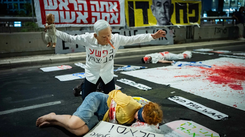 Anti-government protesters demonstrate for the release of Israelis held hostage in the Gaza Strip, outside IDF headquarters in Tel Aviv, Aug. 23, 2025. Photo by Erik Marmor/Flash90.