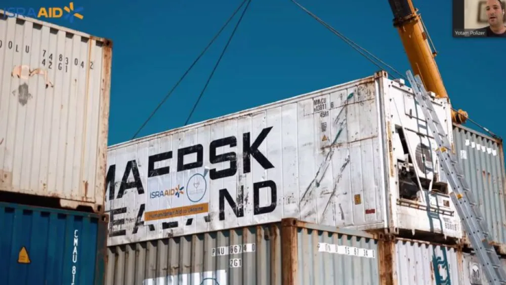 Yotam Polizer explaining how IsraAID ships food and hygiene supplies to displaced Ukrainians. Photo: screenshot