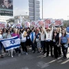 Momentum women join the families of captives in Gaza marching in Modi'in for their release, Nov. 16, 2023. Photo by Aviram Waldman.