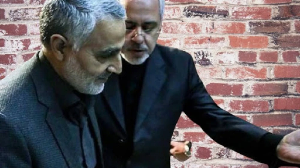 Iran's Quds Force commander Maj. Gen. Qassem Soleimani (foreground) and Iranian Foreign Minister Mohammmad Javad Zarif. Credit: Didban-Iran.