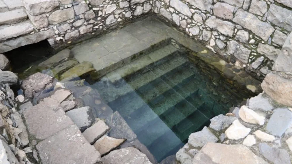 An ancient mikveh (ritual bath) at Magdala. Photo by Felipe Arcila
