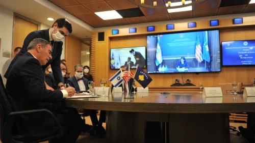 Israel’s Foreign Minister Gabi Ashkenazi and Kosovo Foreign Minister Meliza Haradinaj-Stublla sign an agreement establishing diplomatic relations between the two countries on Feb. 1, 2021. Source: Gabi Ashkenazi/Twitter.